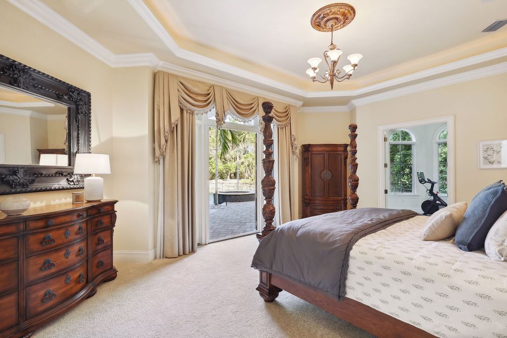 2539 Escada Court, Naples, Florida is a custom-built estate just minutes to world class beaches, shopping and fine dining with picturesque pool and lake views from just about every room.