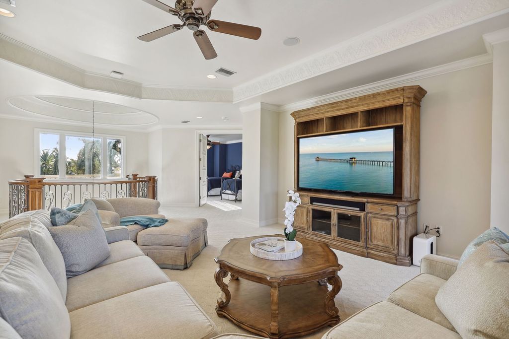 2539 Escada Court, Naples, Florida is a custom-built estate just minutes to world class beaches, shopping and fine dining with picturesque pool and lake views from just about every room.