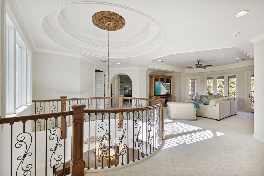 2539 Escada Court, Naples, Florida is a custom-built estate just minutes to world class beaches, shopping and fine dining with picturesque pool and lake views from just about every room.