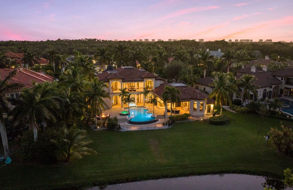 2539 Escada Court, Naples, Florida is a custom-built estate just minutes to world class beaches, shopping and fine dining with picturesque pool and lake views from just about every room.