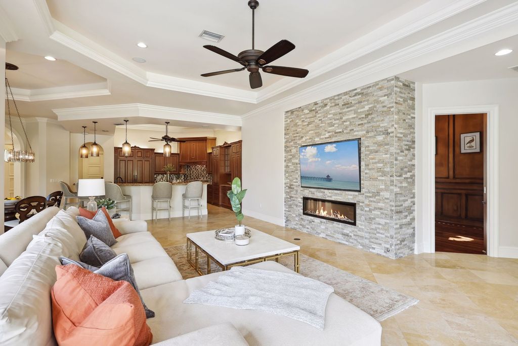 2539 Escada Court, Naples, Florida is a custom-built estate just minutes to world class beaches, shopping and fine dining with picturesque pool and lake views from just about every room.