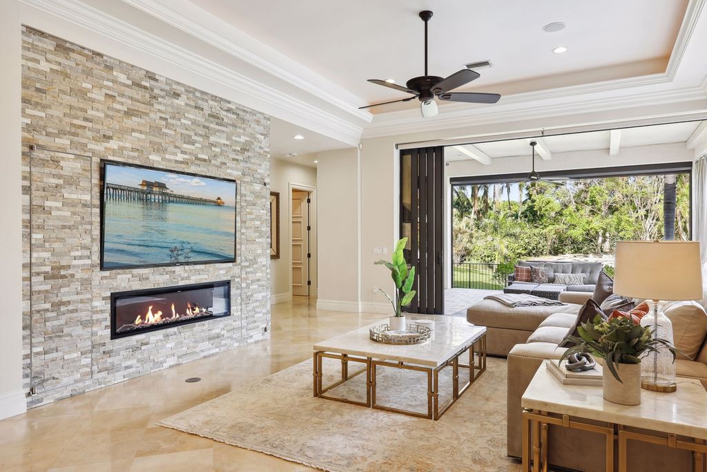 2539 Escada Court, Naples, Florida is a custom-built estate just minutes to world class beaches, shopping and fine dining with picturesque pool and lake views from just about every room.