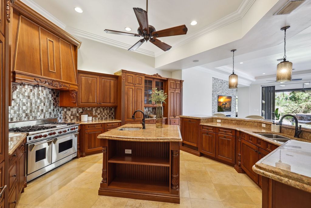 2539 Escada Court, Naples, Florida is a custom-built estate just minutes to world class beaches, shopping and fine dining with picturesque pool and lake views from just about every room.