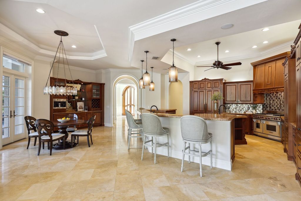 2539 Escada Court, Naples, Florida is a custom-built estate just minutes to world class beaches, shopping and fine dining with picturesque pool and lake views from just about every room.