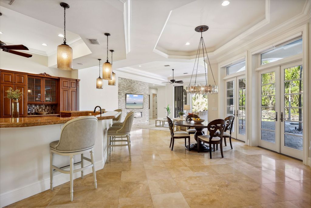 2539 Escada Court, Naples, Florida is a custom-built estate just minutes to world class beaches, shopping and fine dining with picturesque pool and lake views from just about every room.