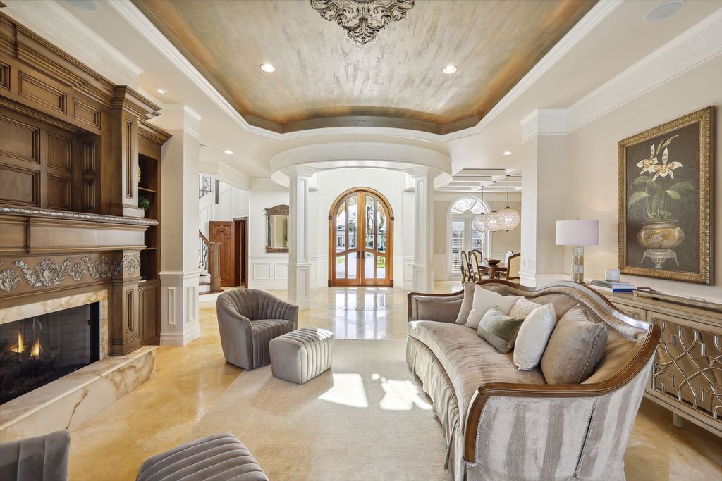 2539 Escada Court, Naples, Florida is a custom-built estate just minutes to world class beaches, shopping and fine dining with picturesque pool and lake views from just about every room.
