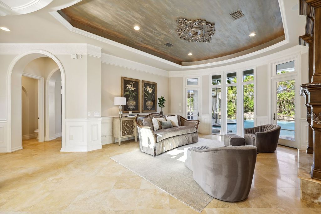 2539 Escada Court, Naples, Florida is a custom-built estate just minutes to world class beaches, shopping and fine dining with picturesque pool and lake views from just about every room.