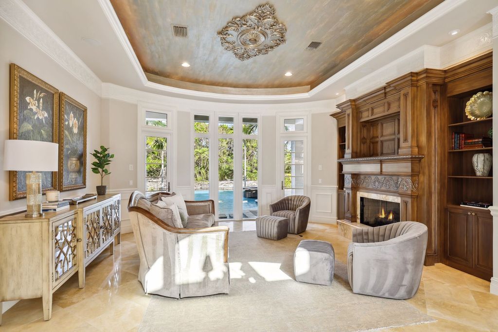 2539 Escada Court, Naples, Florida is a custom-built estate just minutes to world class beaches, shopping and fine dining with picturesque pool and lake views from just about every room.