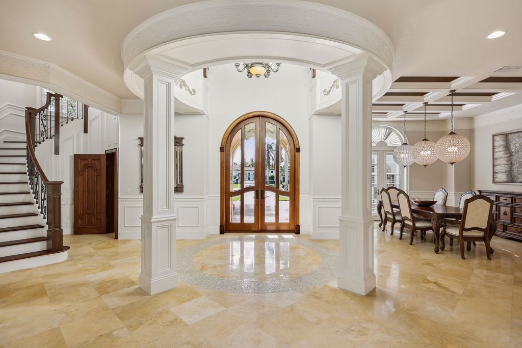 2539 Escada Court, Naples, Florida is a custom-built estate just minutes to world class beaches, shopping and fine dining with picturesque pool and lake views from just about every room.