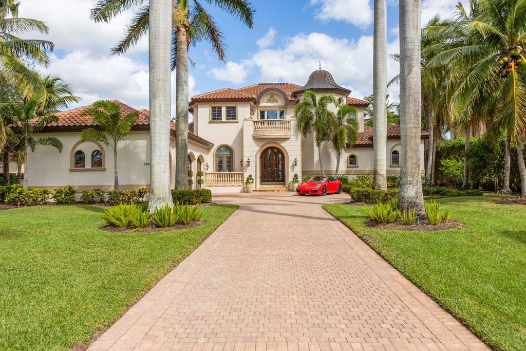 2539 Escada Court, Naples, Florida is a custom-built estate just minutes to world class beaches, shopping and fine dining with picturesque pool and lake views from just about every room.