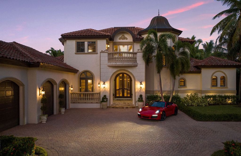 2539 Escada Court, Naples, Florida is a custom-built estate just minutes to world class beaches, shopping and fine dining with picturesque pool and lake views from just about every room.