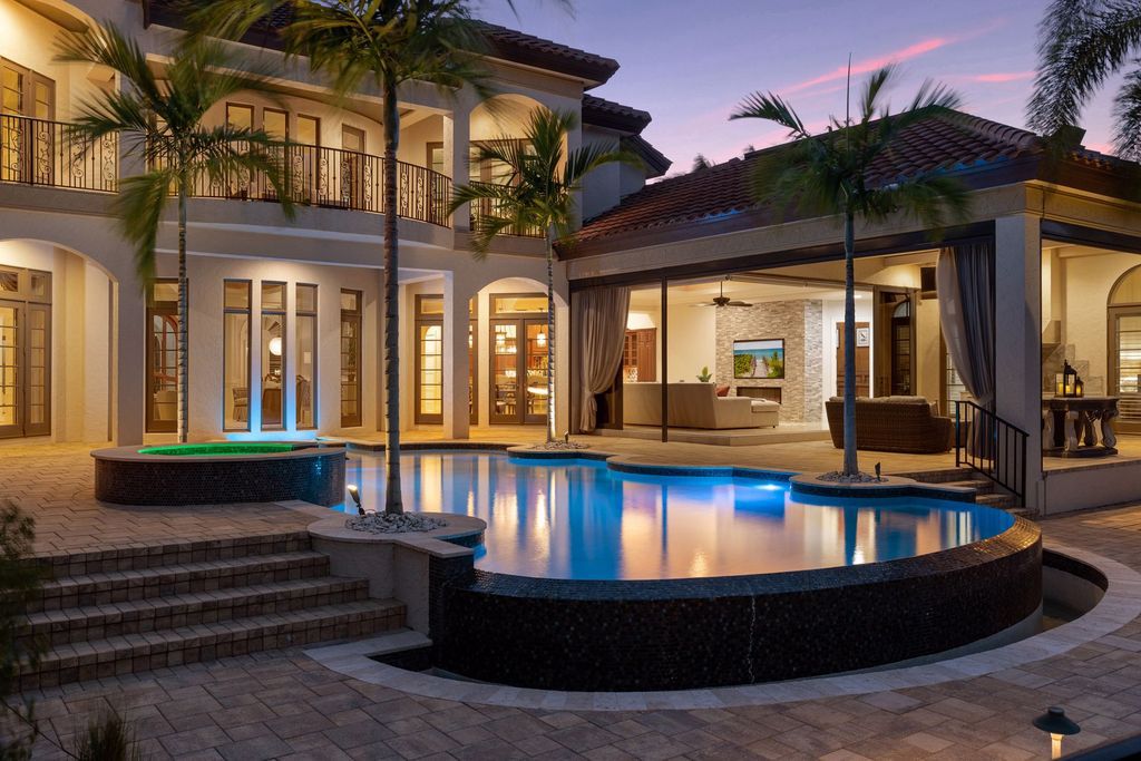 2539 Escada Court, Naples, Florida is a custom-built estate just minutes to world class beaches, shopping and fine dining with picturesque pool and lake views from just about every room.
