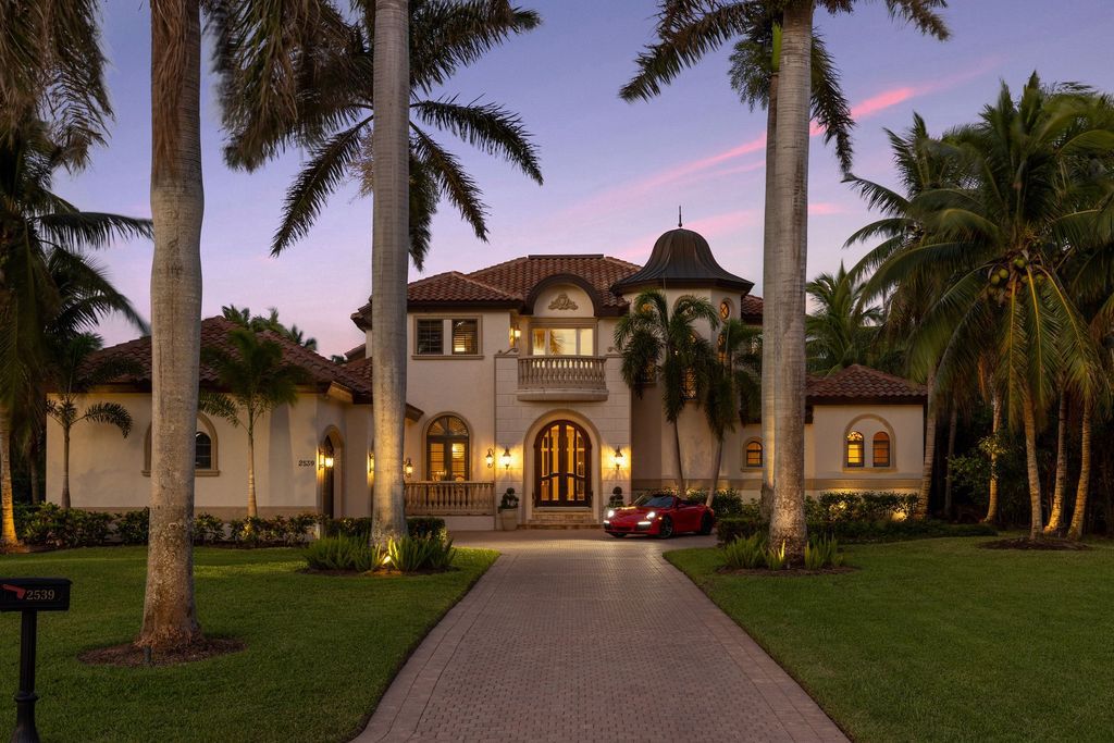 2539 Escada Court, Naples, Florida is a custom-built estate just minutes to world class beaches, shopping and fine dining with picturesque pool and lake views from just about every room.
