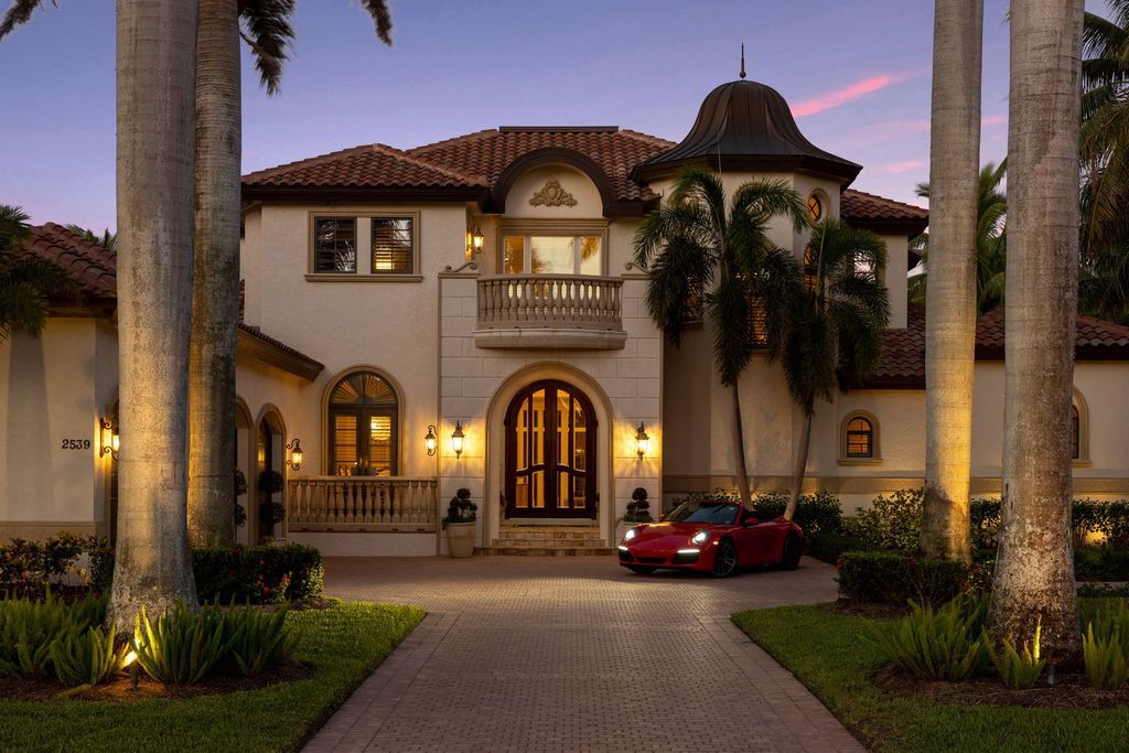 2539 Escada Court, Naples, Florida is a custom-built estate just minutes to world class beaches, shopping and fine dining with picturesque pool and lake views from just about every room.