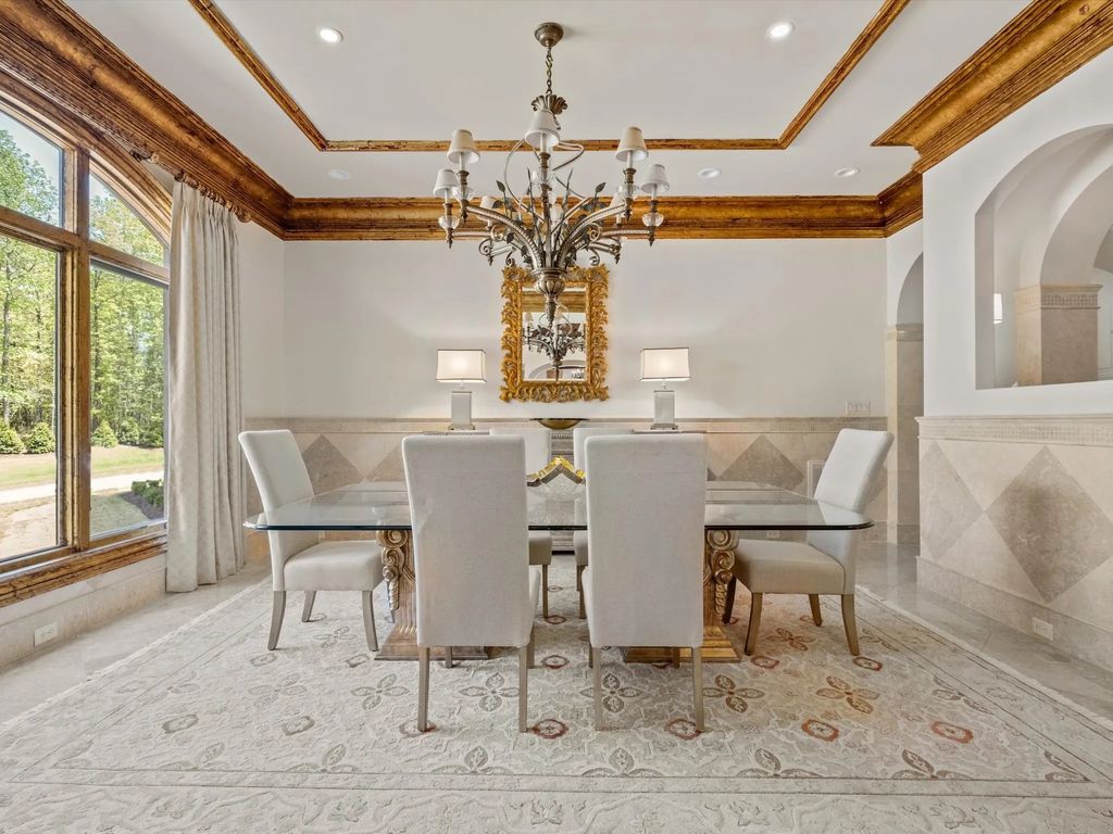 The Home in Charlotte is an impressive Mediterranean estate with breathtaking architectural details, now available for sale. This home located at 16460 Marvin Rd, Charlotte, North Carolina