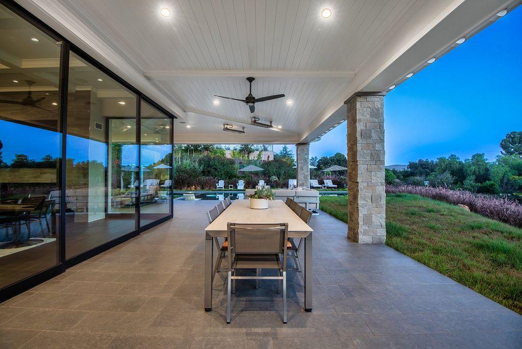 1781 Miller Ranch Drive, Thousand Oaks, California is an epic single story estate with resort quality grounds are simply perfect boasting a full sized basketball court, custom pool and spa.
