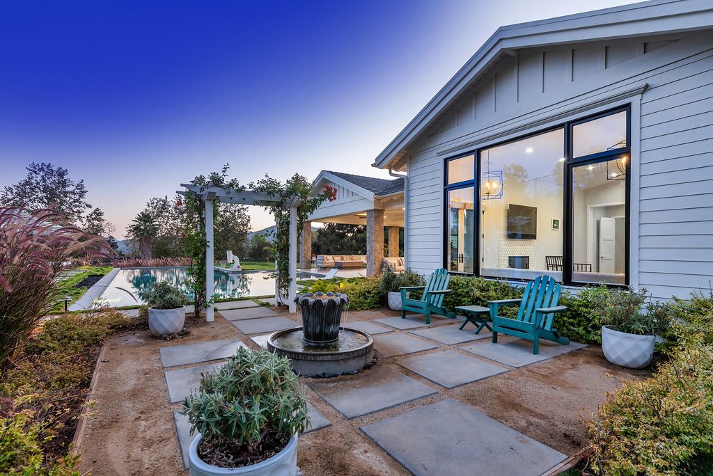1781 Miller Ranch Drive, Thousand Oaks, California is an epic single story estate with resort quality grounds are simply perfect boasting a full sized basketball court, custom pool and spa.
