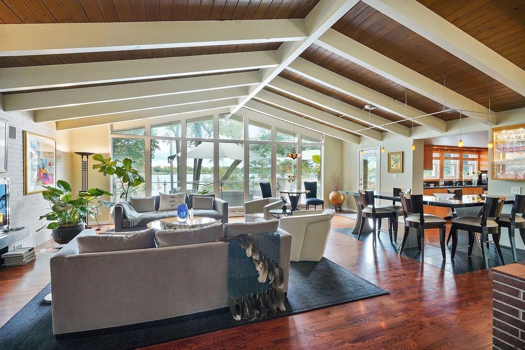 The House in Excelsior offers formal dining room along with unique built-in breakfast bar just off the kitchen, now available for sale. This home located at 2605 Maple Ridge Ln, Excelsior, Minnesota
