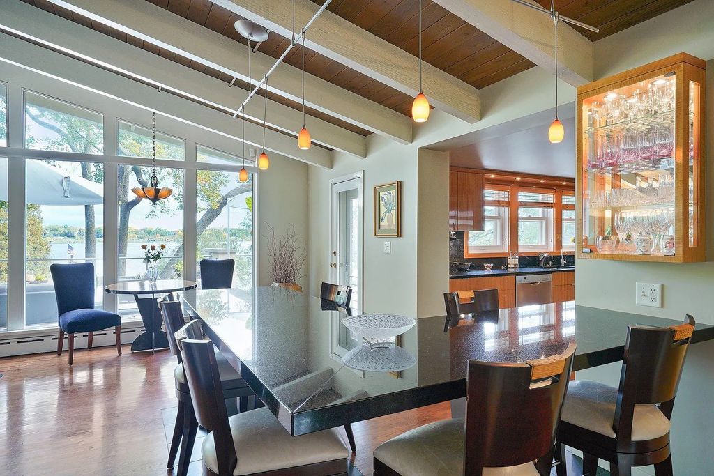 The House in Excelsior offers formal dining room along with unique built-in breakfast bar just off the kitchen, now available for sale. This home located at 2605 Maple Ridge Ln, Excelsior, Minnesota