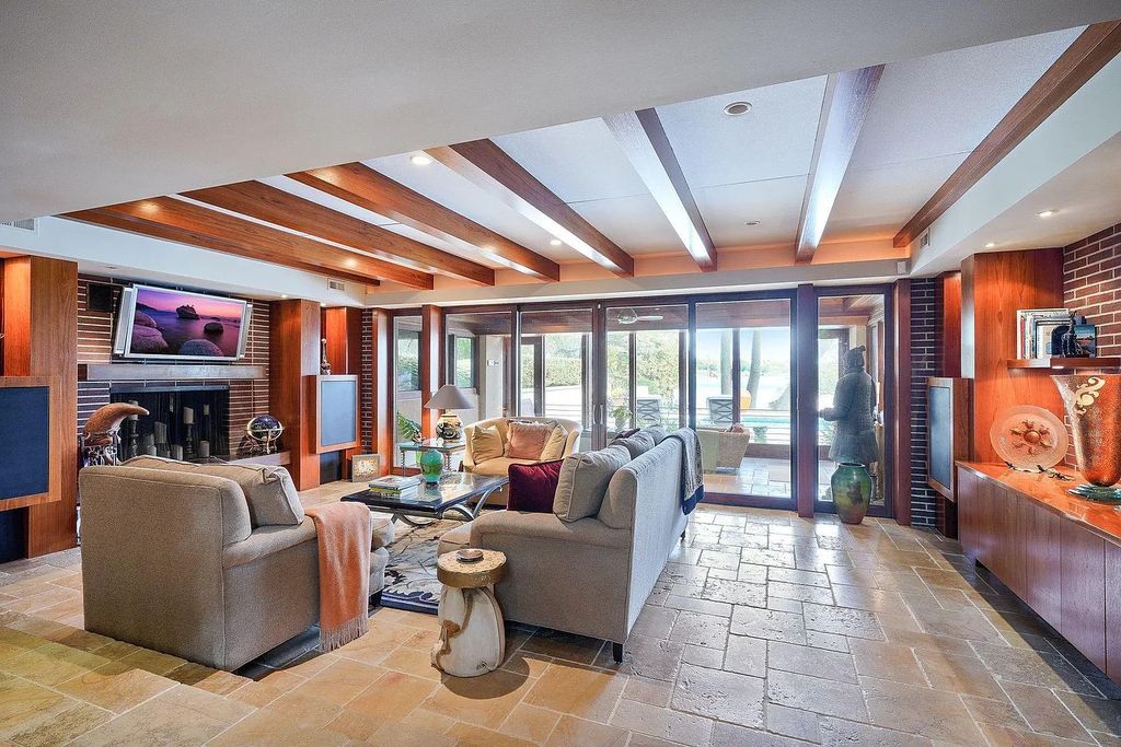 The House in Excelsior offers formal dining room along with unique built-in breakfast bar just off the kitchen, now available for sale. This home located at 2605 Maple Ridge Ln, Excelsior, Minnesota