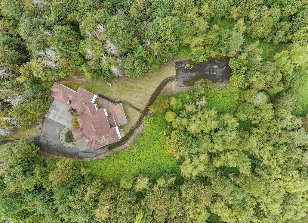 The Estate in Portland is a luxurious home commanding breathtaking panoramic views of 3 mountains now available for sale. This home located at 17010 NW Sheltered Nook Rd, Portland, Oregon; offering 06 bedrooms and 06 bathrooms with 7,719 square feet of living spaces.