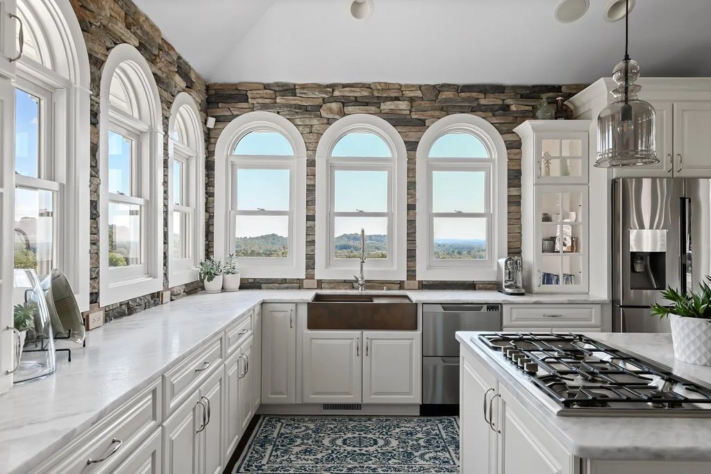 The Estate in Thompsons Station is a luxurious home fully renovated and boasts breathtaking views from every room now available for sale. This home located at 5670 Carters Creek Pike, Thompsons Station, Tennessee; offering 05 bedrooms and 06 bathrooms with 5,362 square feet of living spaces. 