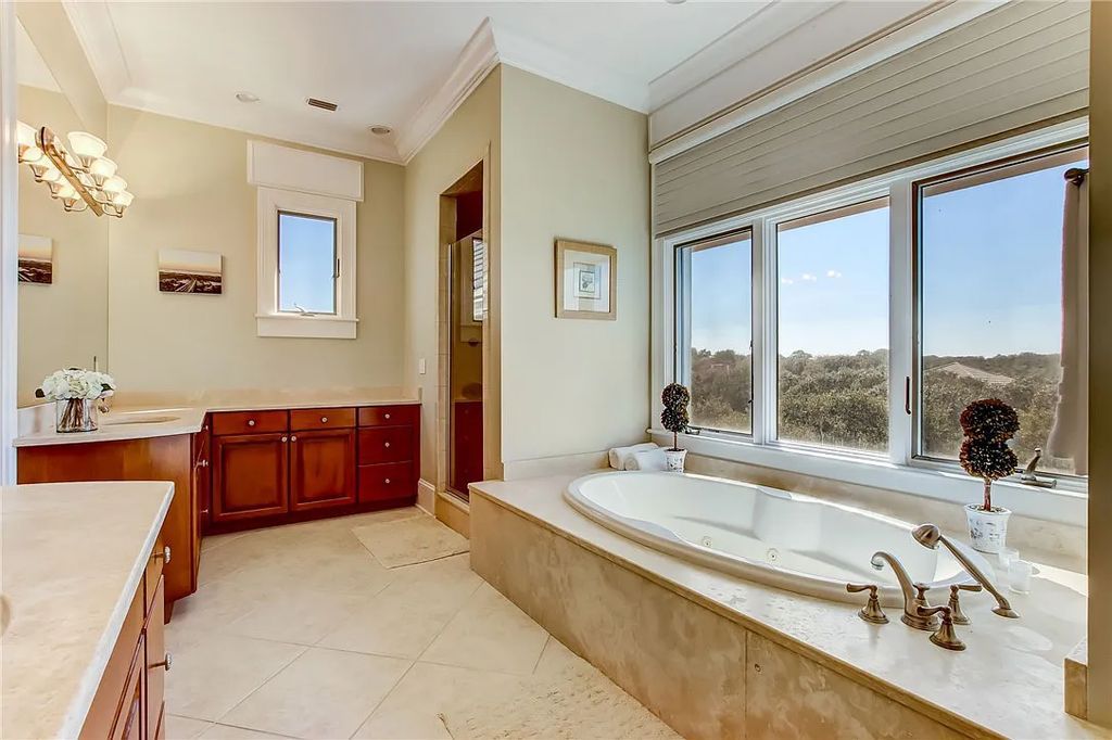 27 Ocean Club Drive, Fernandina Beach, Florida is an extraordinary oceanfront home is located on Ocean Club Drive, one of the most prestigious streets in NE Florida capturing spectacular views of the Atlantic Ocean.