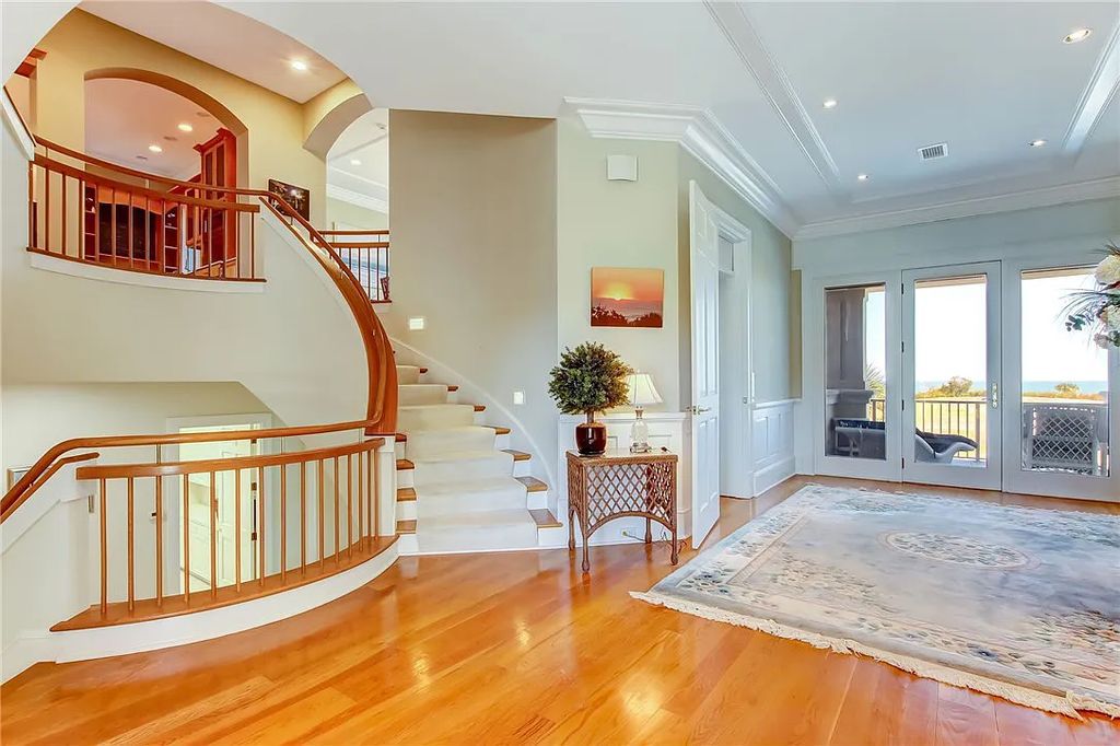 27 Ocean Club Drive, Fernandina Beach, Florida is an extraordinary oceanfront home is located on Ocean Club Drive, one of the most prestigious streets in NE Florida capturing spectacular views of the Atlantic Ocean.
