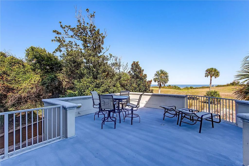 27 Ocean Club Drive, Fernandina Beach, Florida is an extraordinary oceanfront home is located on Ocean Club Drive, one of the most prestigious streets in NE Florida capturing spectacular views of the Atlantic Ocean.