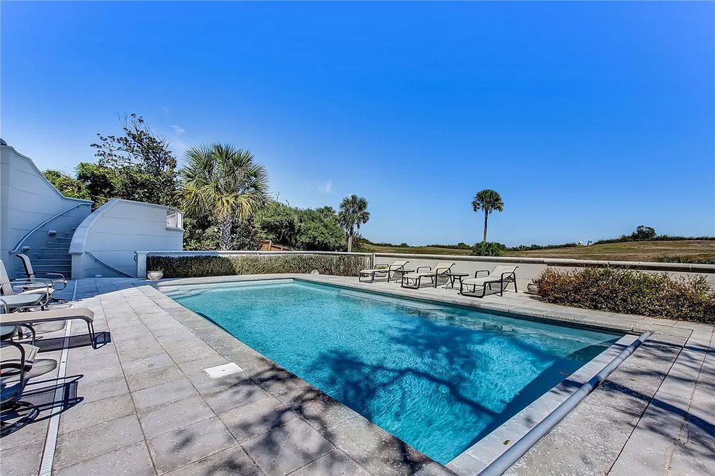 27 Ocean Club Drive, Fernandina Beach, Florida is an extraordinary oceanfront home is located on Ocean Club Drive, one of the most prestigious streets in NE Florida capturing spectacular views of the Atlantic Ocean.