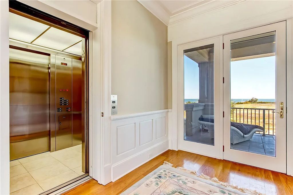 27 Ocean Club Drive, Fernandina Beach, Florida is an extraordinary oceanfront home is located on Ocean Club Drive, one of the most prestigious streets in NE Florida capturing spectacular views of the Atlantic Ocean.