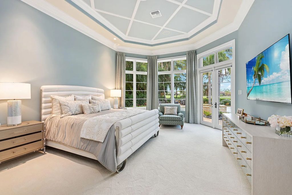 3855 Isla Del Sol Way, Naples, Florida is an impressive in the award-winning community of Fiddler's Creek with a breathtaking view of the pool, lake, and golf course.