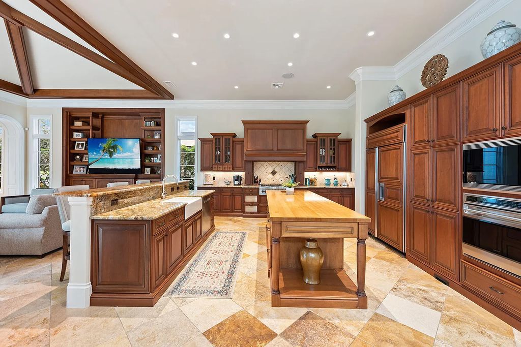 3855 Isla Del Sol Way, Naples, Florida is an impressive in the award-winning community of Fiddler's Creek with a breathtaking view of the pool, lake, and golf course.