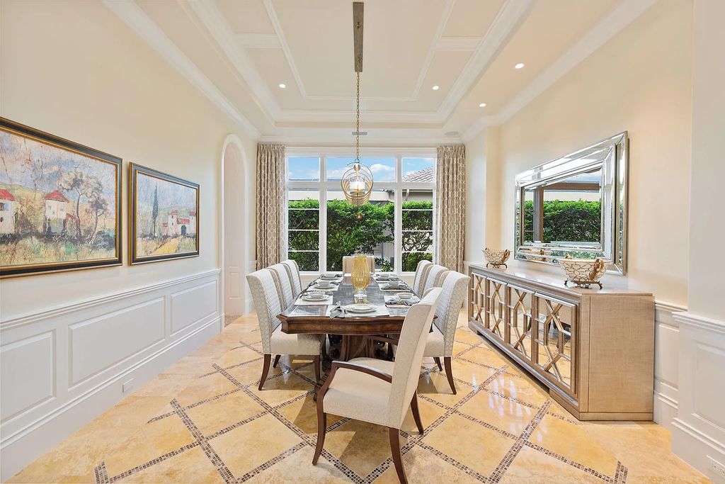 3855 Isla Del Sol Way, Naples, Florida is an impressive in the award-winning community of Fiddler's Creek with a breathtaking view of the pool, lake, and golf course.