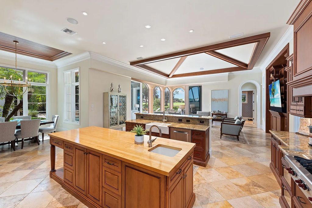 3855 Isla Del Sol Way, Naples, Florida is an impressive in the award-winning community of Fiddler's Creek with a breathtaking view of the pool, lake, and golf course.