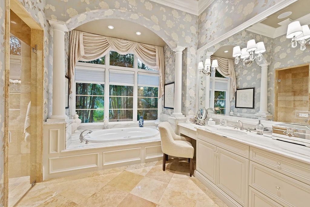 3855 Isla Del Sol Way, Naples, Florida is an impressive in the award-winning community of Fiddler's Creek with a breathtaking view of the pool, lake, and golf course.