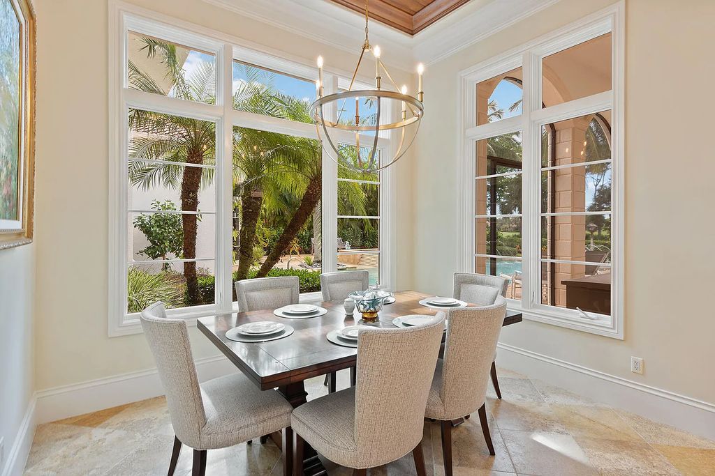 3855 Isla Del Sol Way, Naples, Florida is an impressive in the award-winning community of Fiddler's Creek with a breathtaking view of the pool, lake, and golf course.