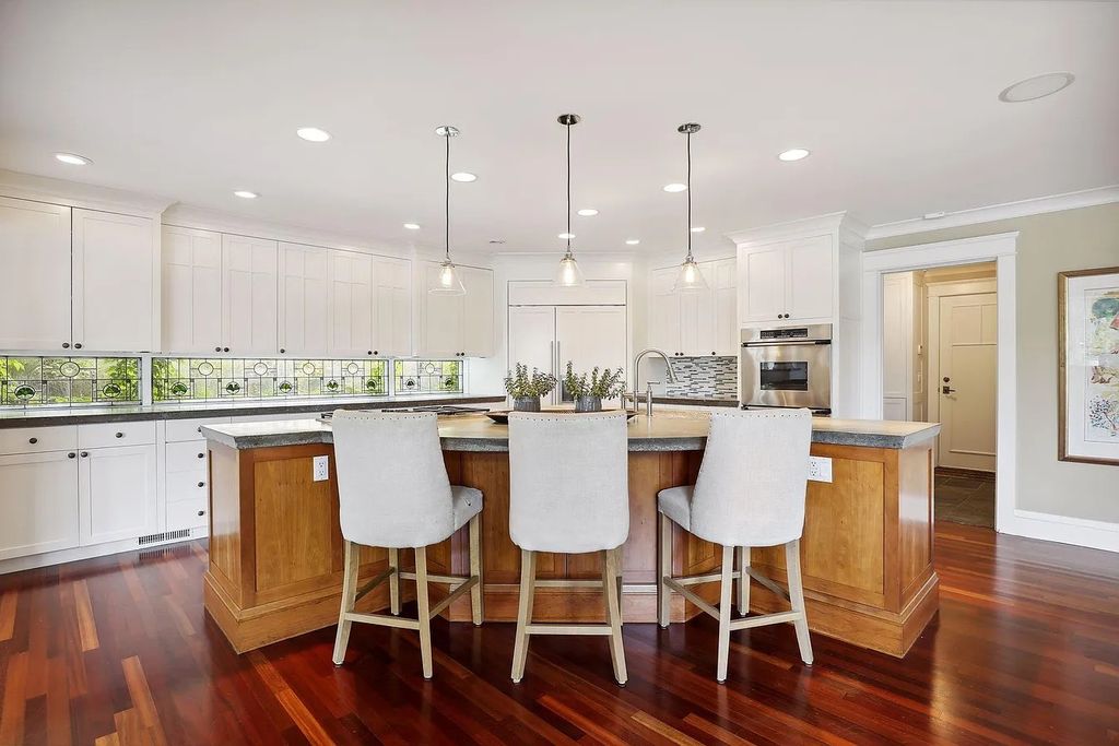 The Property in Edina is Thoughtfully nicknamed “Little Tuscany” the combination of luscious landscaping, golf course views and entertainment area, now available for sale. This home located at 27 Circle W, Edina, Minnesota