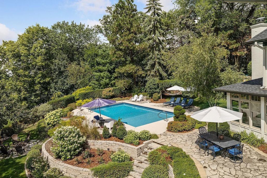 The Property in Edina is Thoughtfully nicknamed “Little Tuscany” the combination of luscious landscaping, golf course views and entertainment area, now available for sale. This home located at 27 Circle W, Edina, Minnesota
