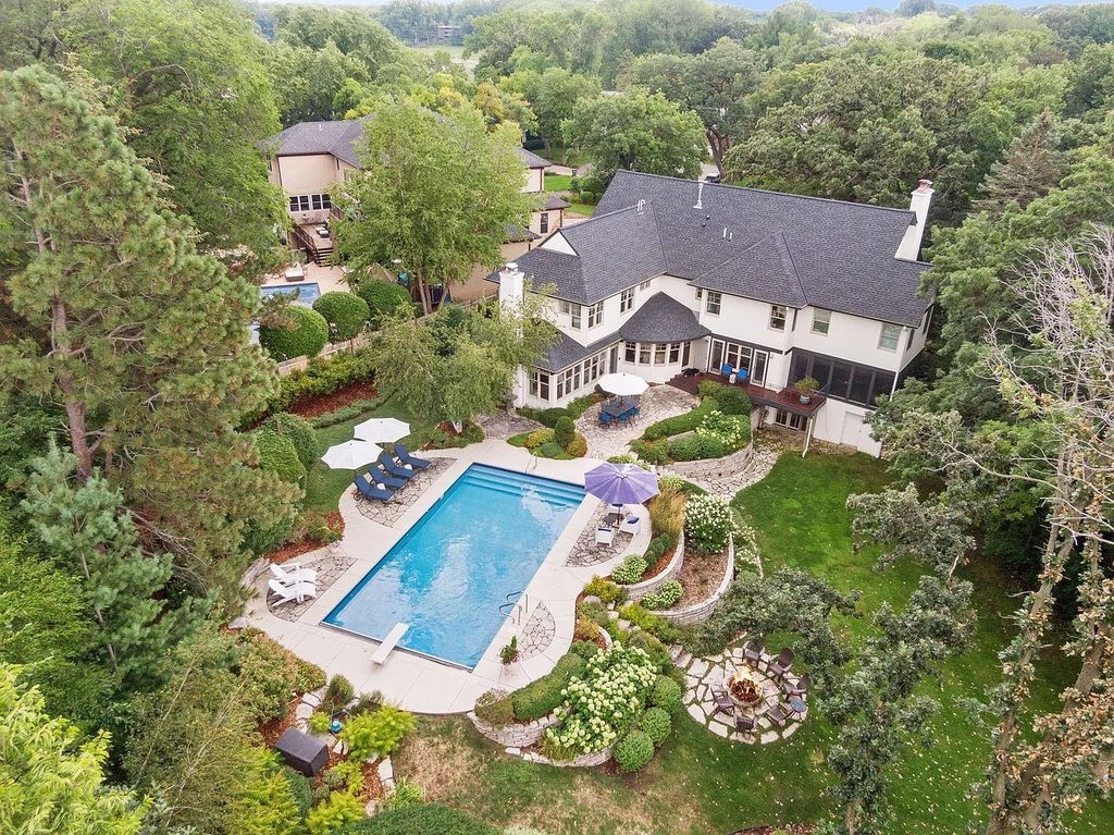 The Property in Edina is Thoughtfully nicknamed “Little Tuscany” the combination of luscious landscaping, golf course views and entertainment area, now available for sale. This home located at 27 Circle W, Edina, Minnesota