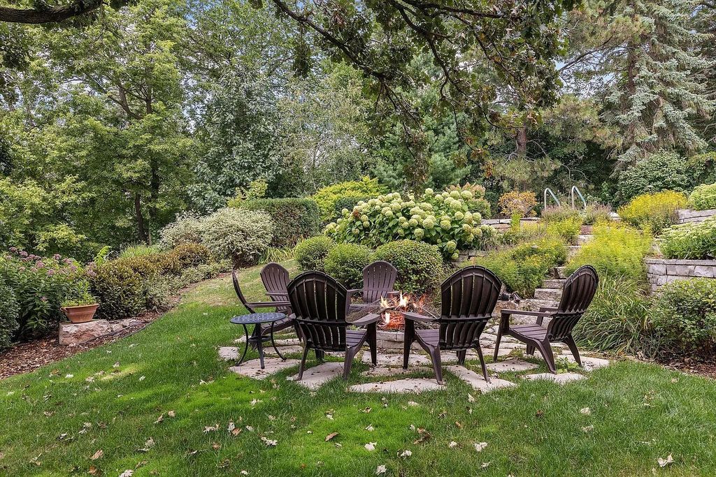 The Property in Edina is Thoughtfully nicknamed “Little Tuscany” the combination of luscious landscaping, golf course views and entertainment area, now available for sale. This home located at 27 Circle W, Edina, Minnesota