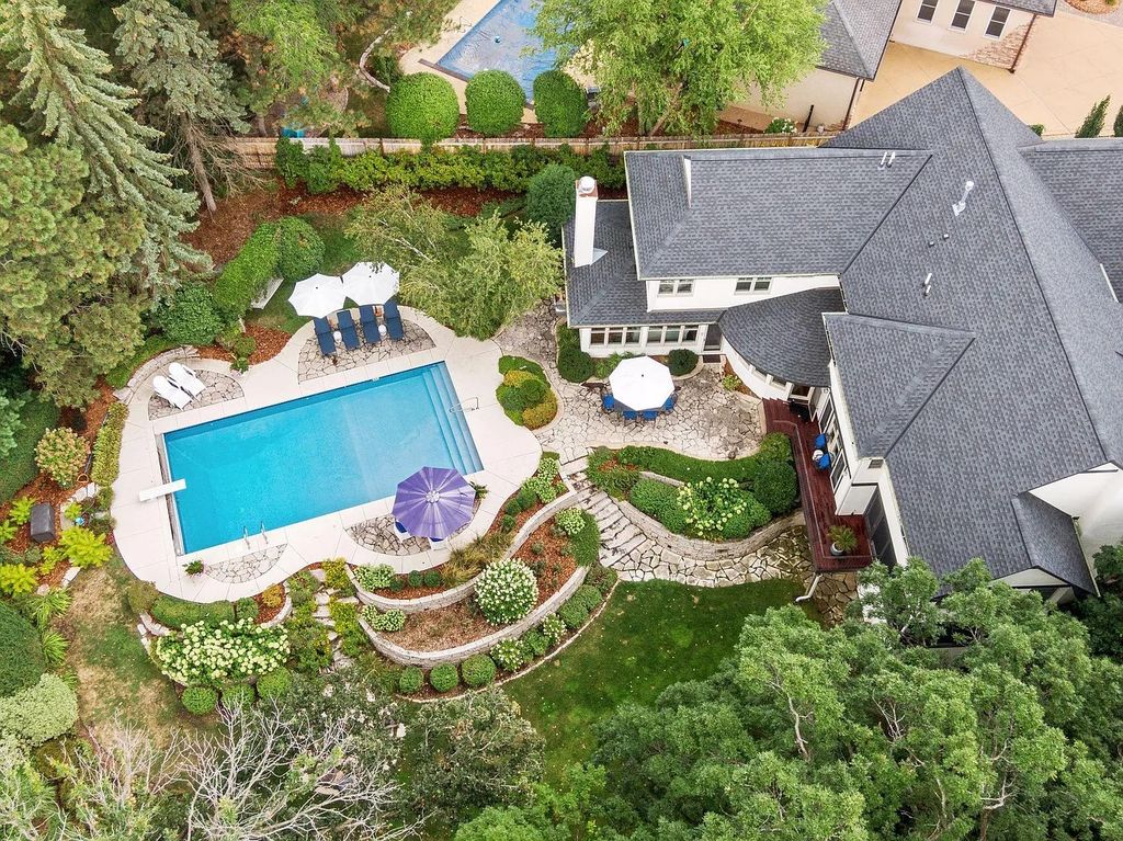 The Property in Edina is Thoughtfully nicknamed “Little Tuscany” the combination of luscious landscaping, golf course views and entertainment area, now available for sale. This home located at 27 Circle W, Edina, Minnesota