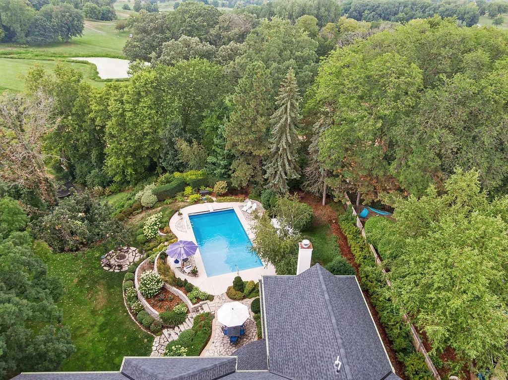 The Property in Edina is Thoughtfully nicknamed “Little Tuscany” the combination of luscious landscaping, golf course views and entertainment area, now available for sale. This home located at 27 Circle W, Edina, Minnesota