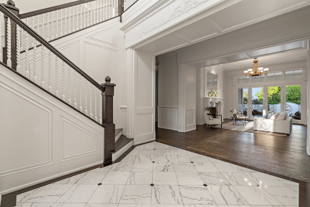208 Bella Riva Drive, Austin, Texas seated on a well-manicured acre lot with complete privacy and lake views in the coveted gated community of Costa Bella on Lake Travis boasting timeless, high-quality craftsmanship abounds in every corner.