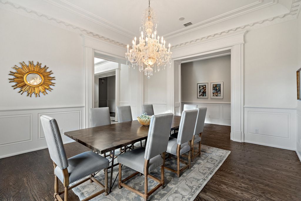 208 Bella Riva Drive, Austin, Texas seated on a well-manicured acre lot with complete privacy and lake views in the coveted gated community of Costa Bella on Lake Travis boasting timeless, high-quality craftsmanship abounds in every corner.