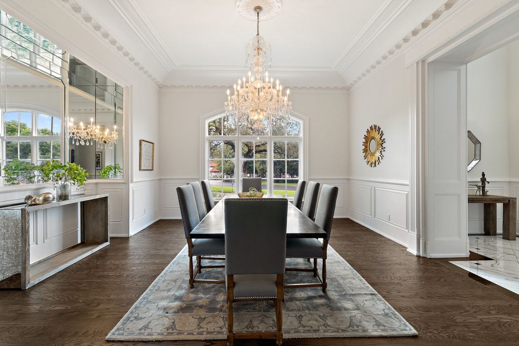 208 Bella Riva Drive, Austin, Texas seated on a well-manicured acre lot with complete privacy and lake views in the coveted gated community of Costa Bella on Lake Travis boasting timeless, high-quality craftsmanship abounds in every corner.