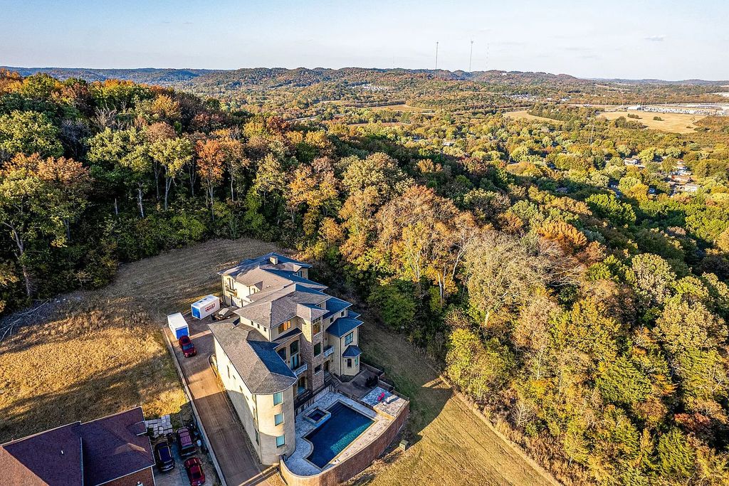 The Home in Nashville is equipped with designer finishes and custom features and elevator service for all 3 floors & basement, now available for sale. This home located at 3412 Fairmeade Dr, Nashville, Tennessee