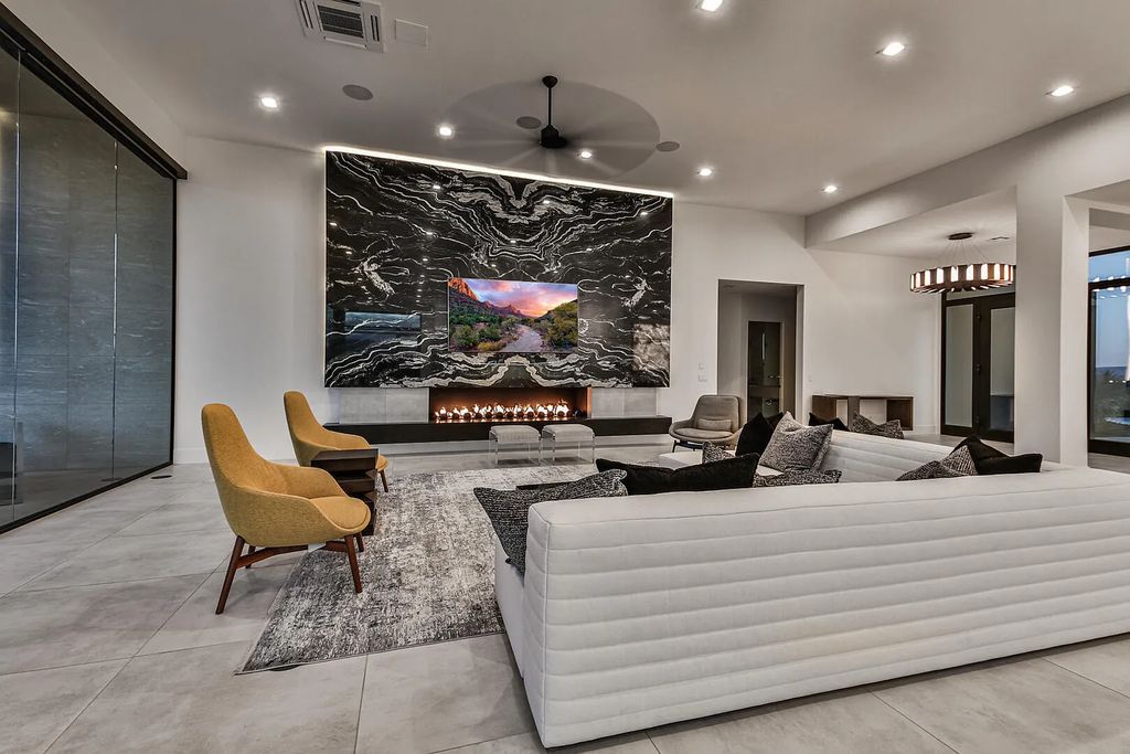 2399 N Kiva Trail, Saint George, Utah is a truly one of a kind contemporary estate sits 28 feet above the street below, boasts 360 degree views, including a picture perfect framing of Snow Canyon, Red Mountain, Pine Valley Mountain, Movie Rock, and the Kachina Cliffs.