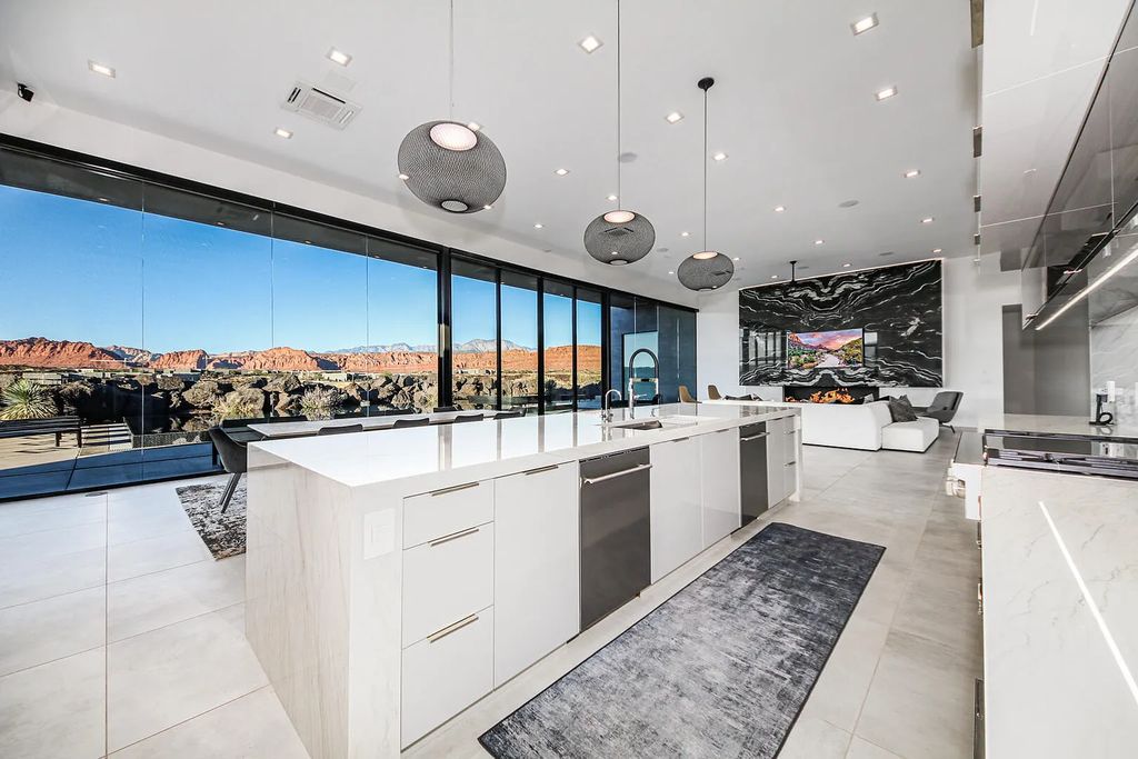 2399 N Kiva Trail, Saint George, Utah is a truly one of a kind contemporary estate sits 28 feet above the street below, boasts 360 degree views, including a picture perfect framing of Snow Canyon, Red Mountain, Pine Valley Mountain, Movie Rock, and the Kachina Cliffs.