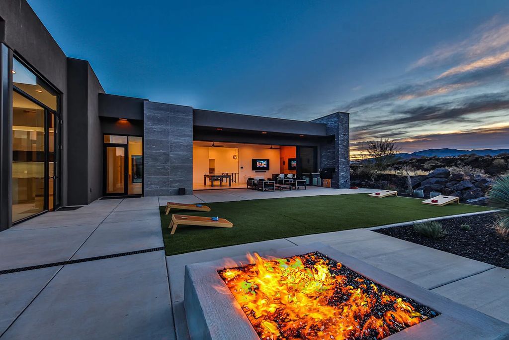 2399 N Kiva Trail, Saint George, Utah is a truly one of a kind contemporary estate sits 28 feet above the street below, boasts 360 degree views, including a picture perfect framing of Snow Canyon, Red Mountain, Pine Valley Mountain, Movie Rock, and the Kachina Cliffs.